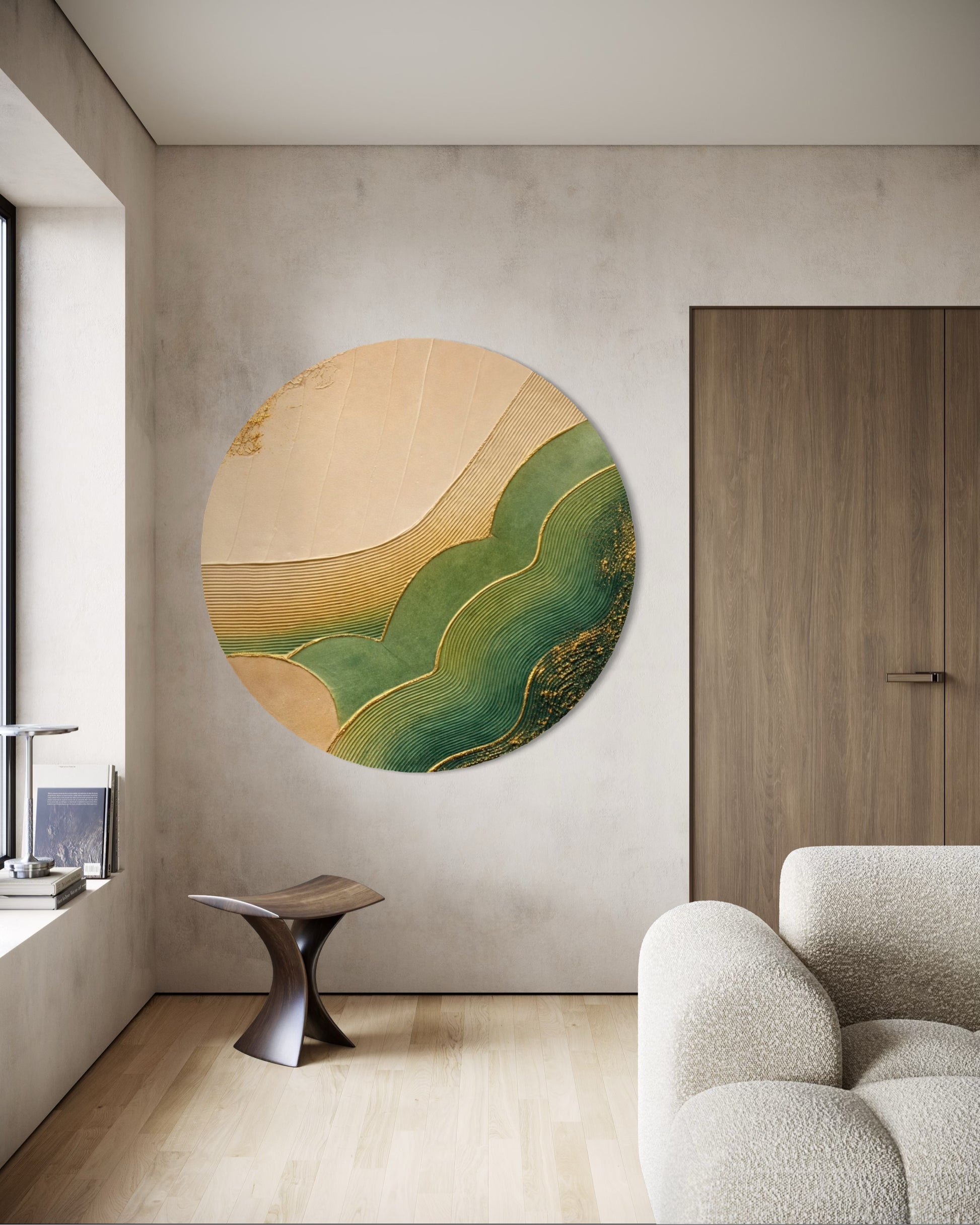 Round abstract wall art in a modern living room with a neutral color palette.