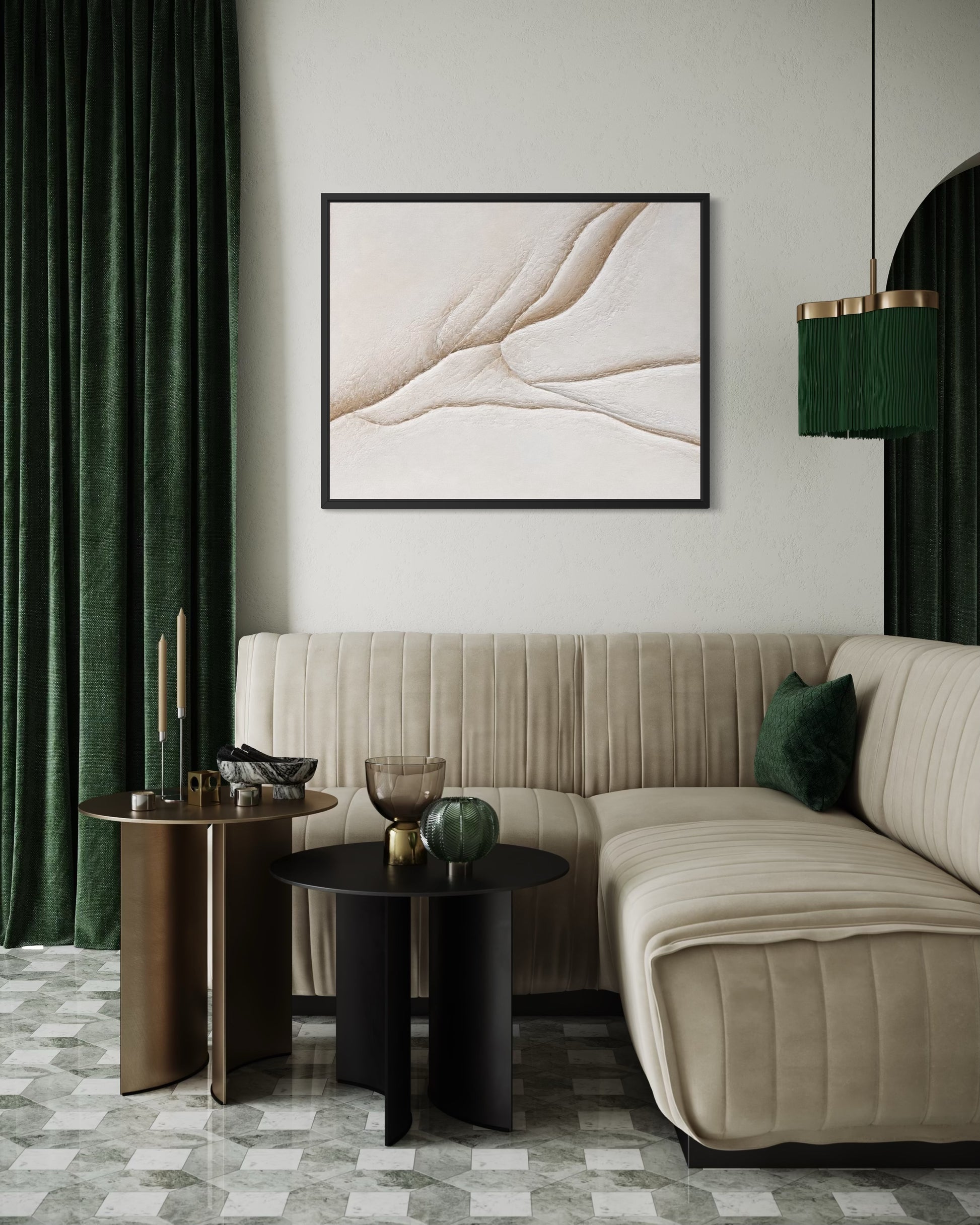 A framed abstract art print with flowing beige and cream lines hangs on a light gray wall above a beige sectional sofa in a modern living room with dark green curtains and side tables.