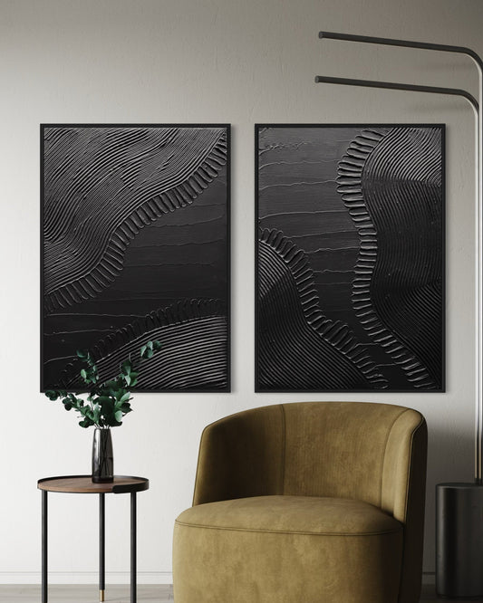 Modern interior with a brown armchair, side table, and abstract wall art in black