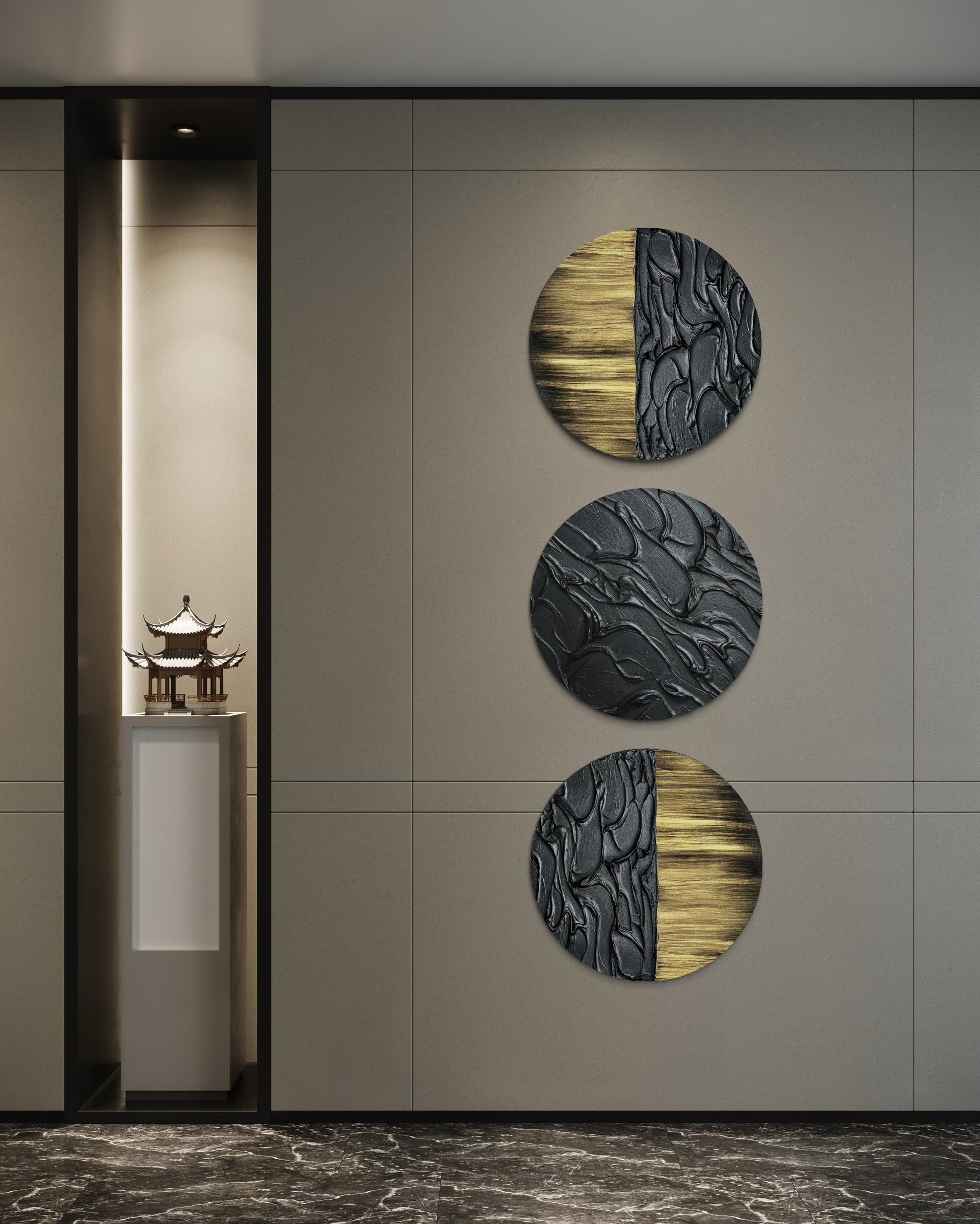 Set of three black round canvases featuring organic gold highlights and 3D surface design