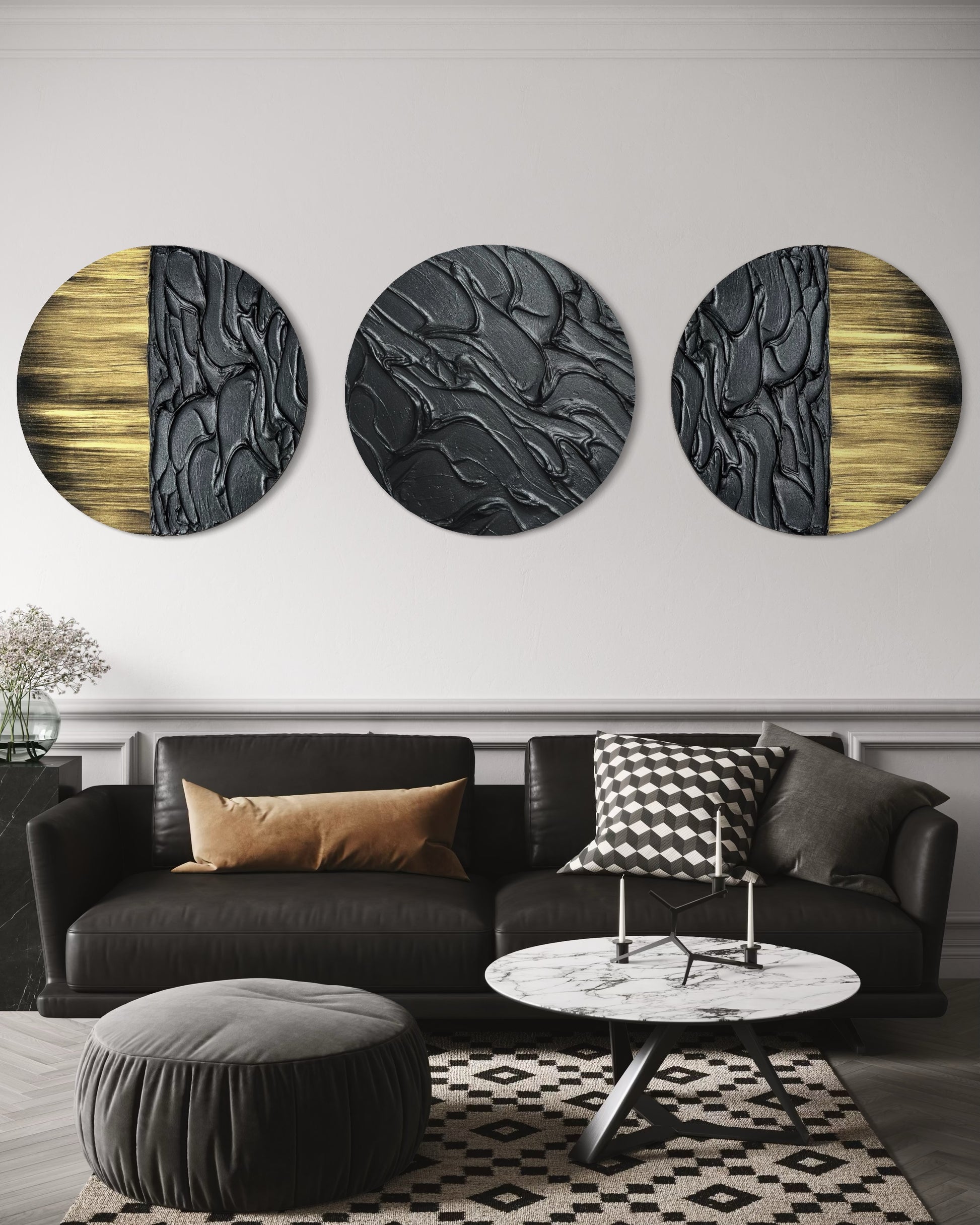 Luxe black and gold round canvas artwork trio styled in a contemporary living room