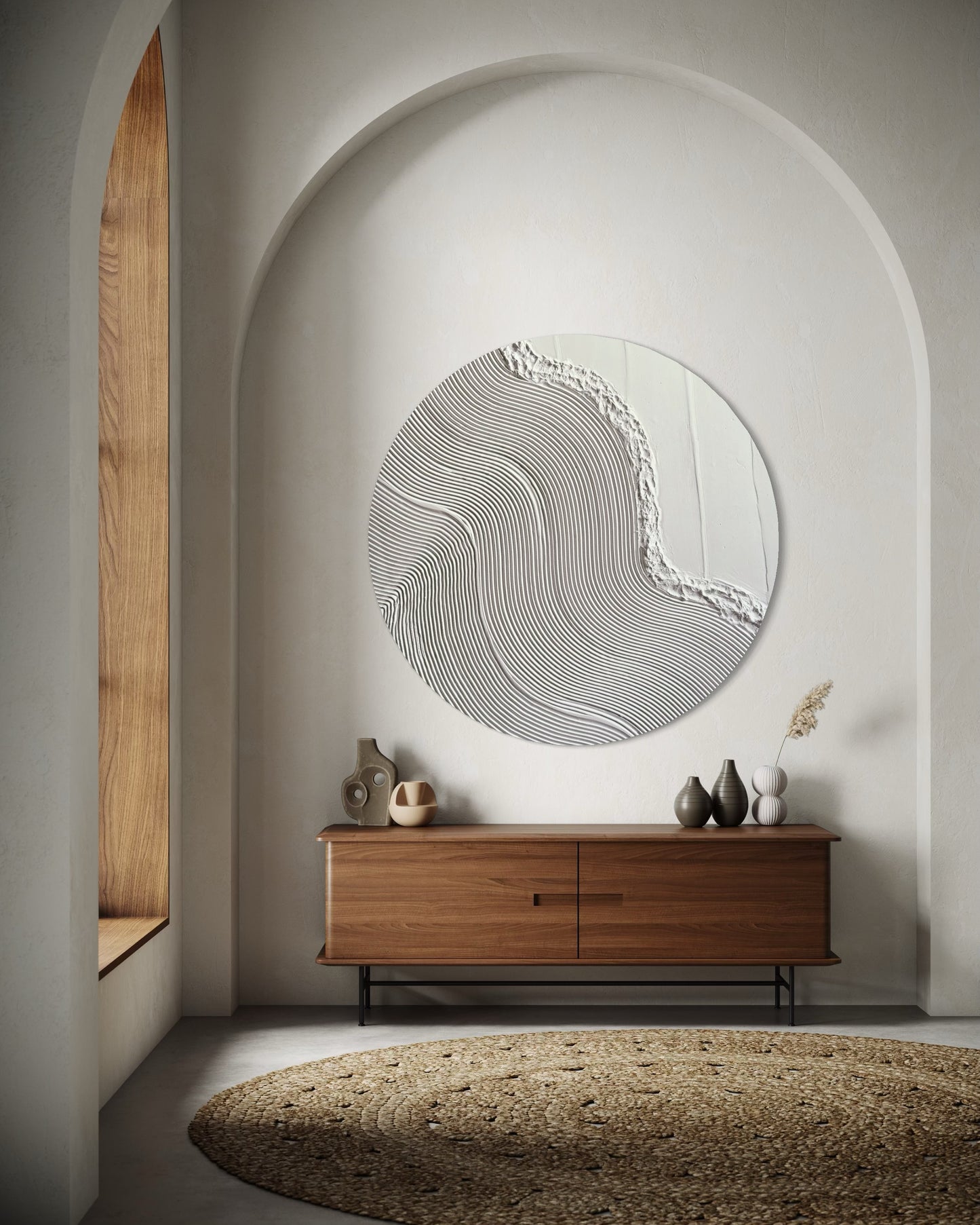Handmade round wall art featuring sculptural white texture