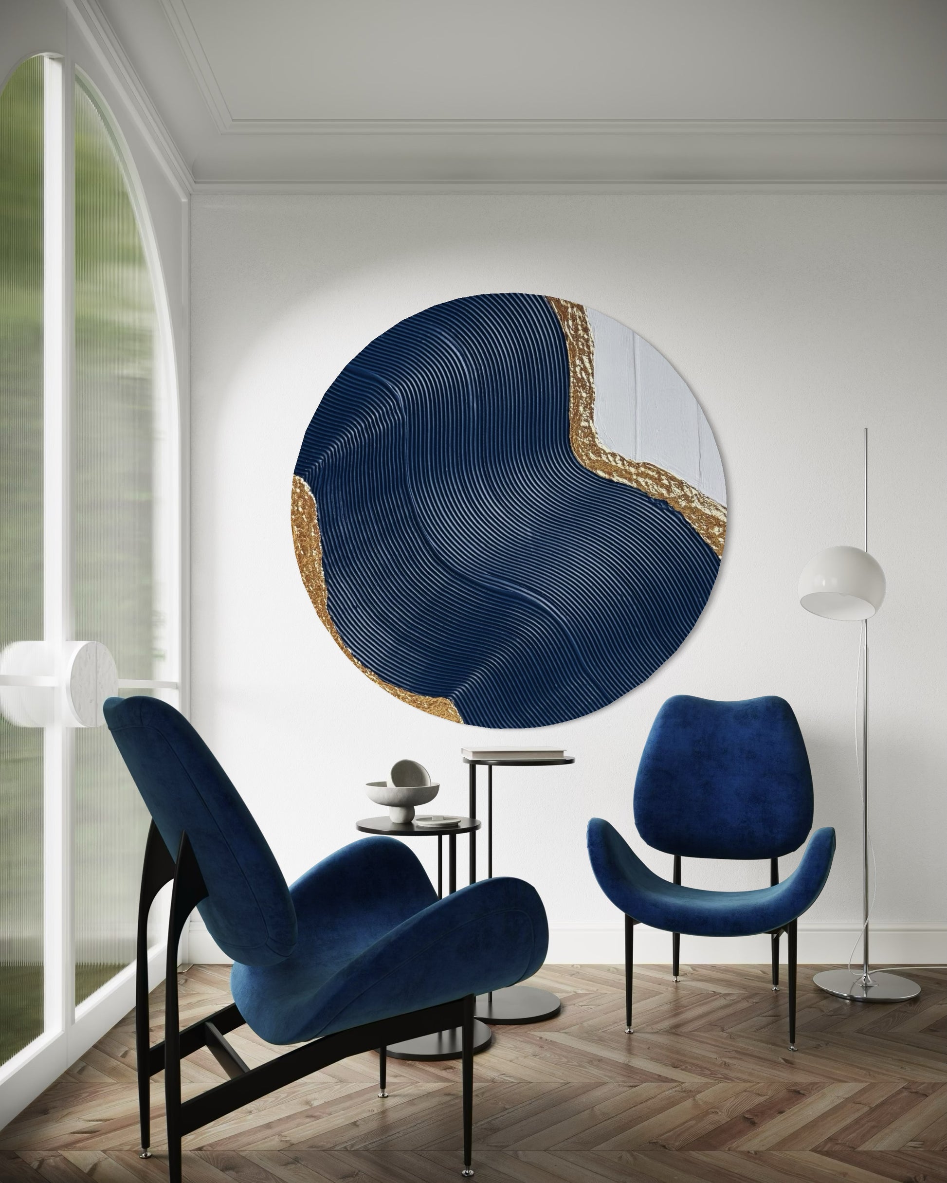 Modern interior with blue chairs and a decorative wall piece.