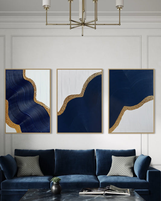LOKI set of 3 textured wall art with navy wave design and gold leaf on white canvas


