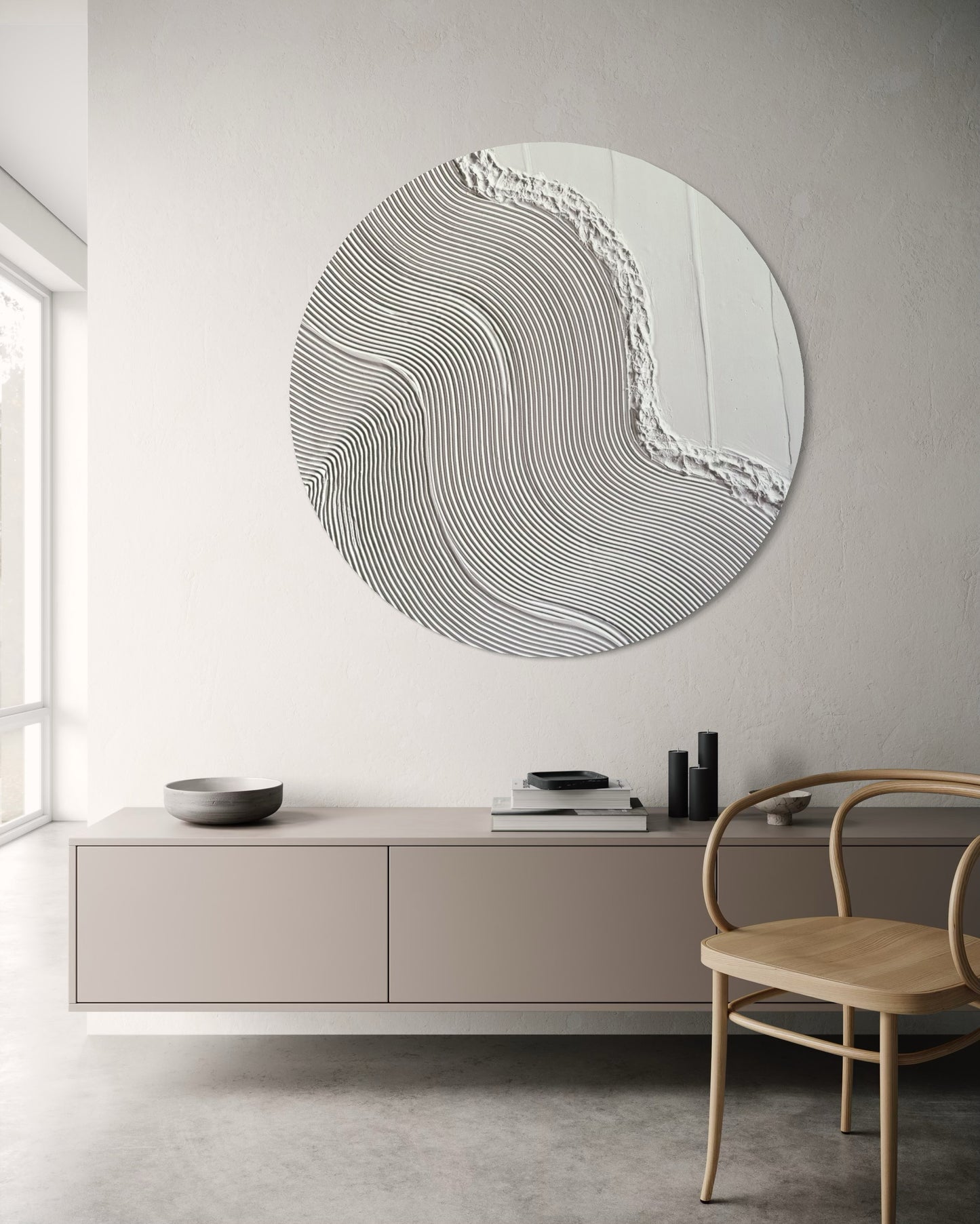 Minimalist circular canvas art in all-white with raised texture