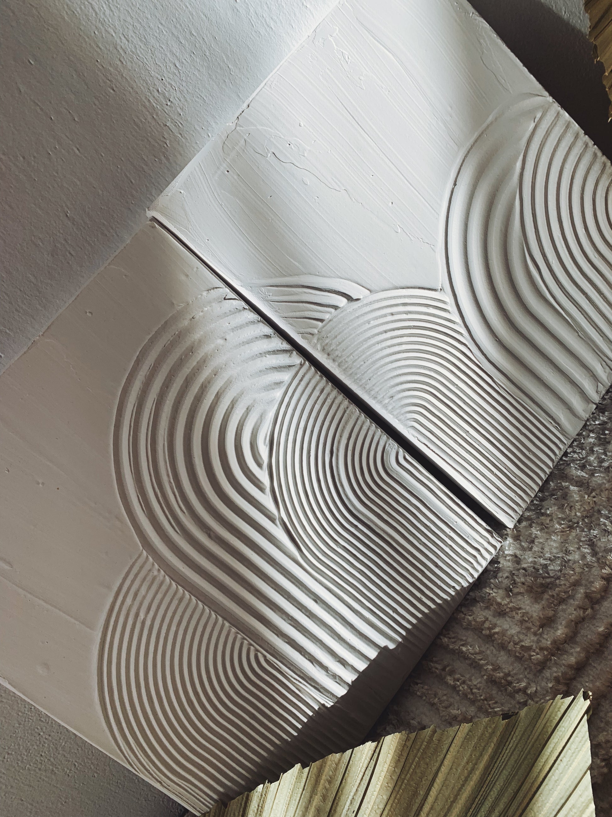 Close-up of a textured concrete surface with circular patterns