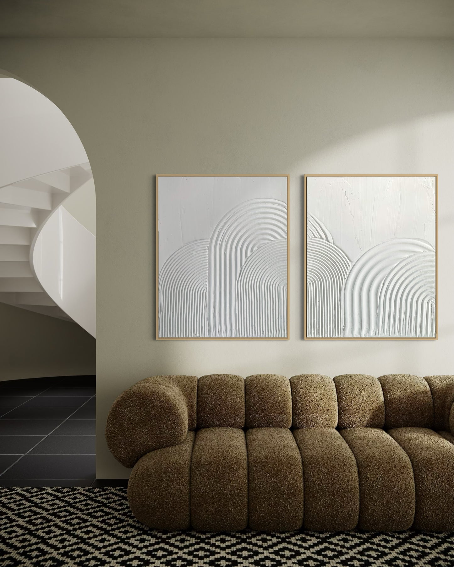 Modern living room with a brown sofa and abstract wall art in white 